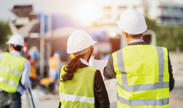 body corporate developers services employees at a construction site